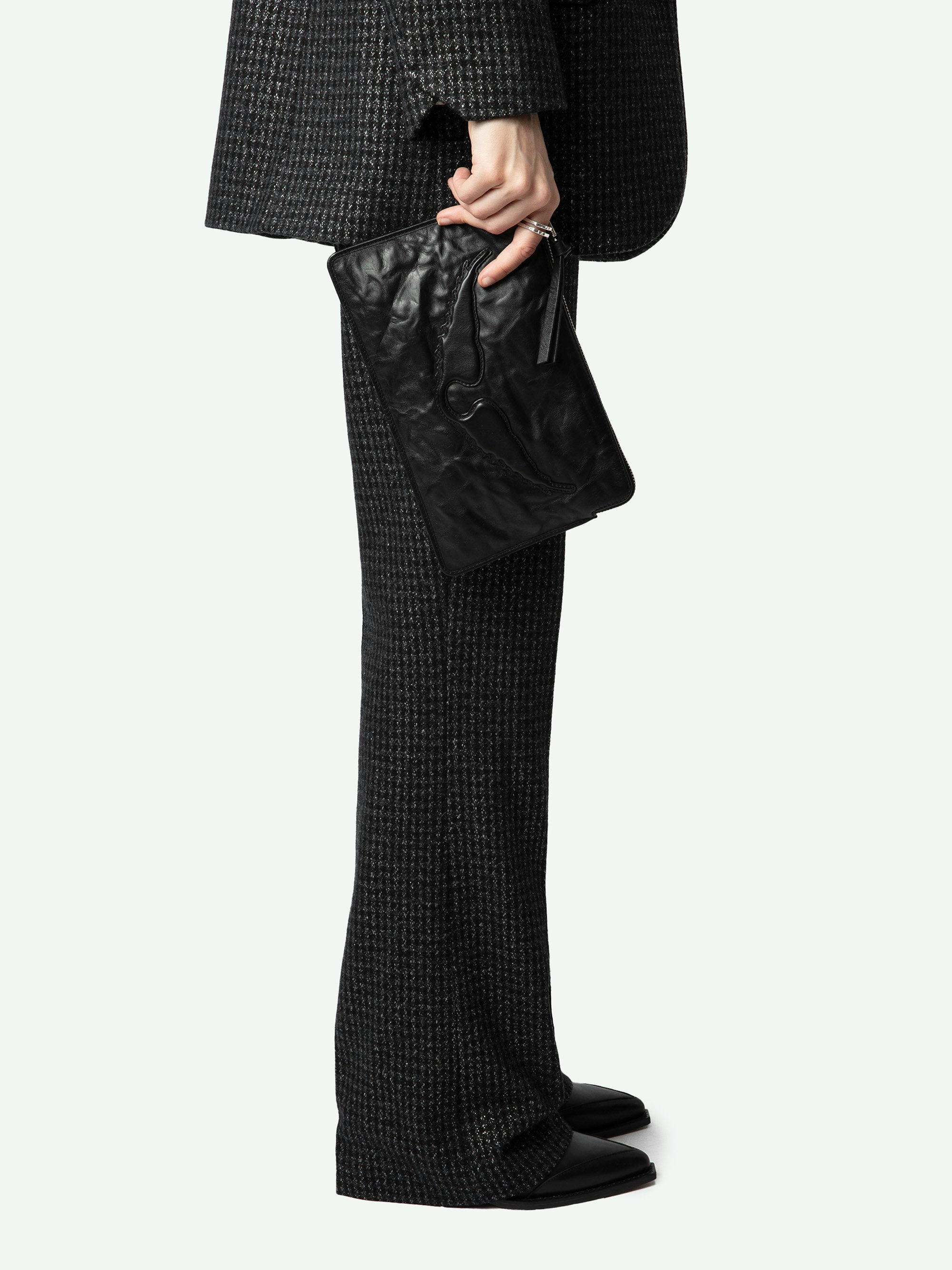 Angel Pochette - Grained leather clutch adorned with an embossed wing signature.